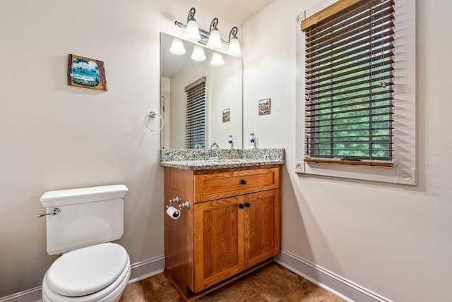 14699 Lee Road 188, Waverly, AL 36879 - bathroom featuring toilet, baseboards, and vanity