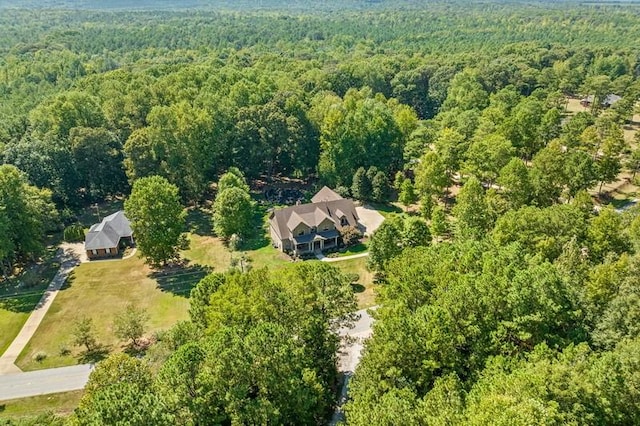 aerial view with a wooded view