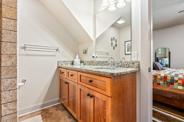 14699 Lee Road 188, Waverly, AL 36879 - ensuite bathroom featuring baseboards, vanity, and ensuite bath