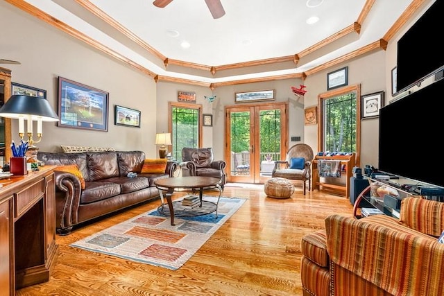 14699 Lee Road 188, Waverly, AL 36879 - living room featuring french doors, crown molding, a raised ceiling, light wood-style floors, and ceiling fan