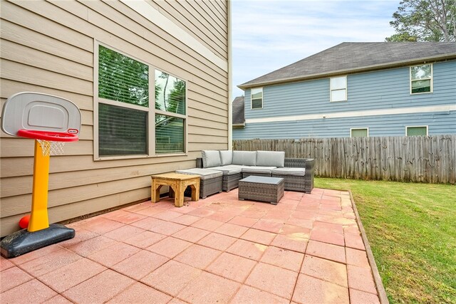 view of patio featuring fence and outdoor lounge area