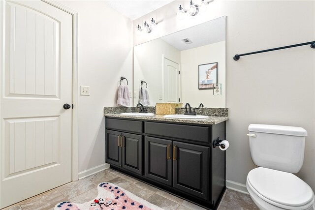full bathroom featuring baseboards, visible vents, a sink, and toilet