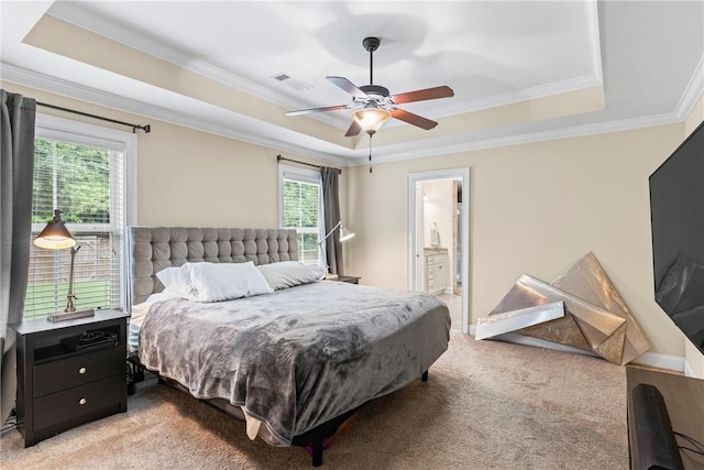 661 Deer Run Rd, Auburn, AL 36832 - bedroom featuring a tray ceiling, multiple windows, light carpet, crown molding, and ceiling fan