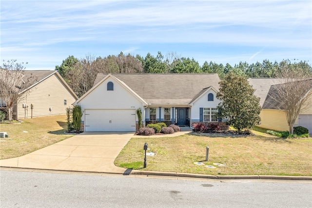 single story home featuring driveway, an attached garage, and a front lawn