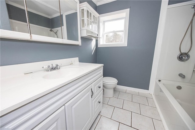 bathroom with tile patterned floors, baseboards, vanity, toilet, and bathing tub / shower combination