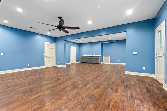 1806 Bluestone Ct, Auburn, AL 36830 - unfurnished living room with a ceiling fan, dark wood finished floors, baseboards, recessed lighting, and bar