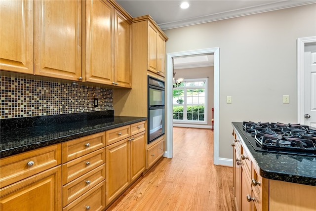 1806 Bluestone Ct, Auburn, AL 36830 - kitchen featuring black appliances, crown molding, decorative backsplash, light wood-type flooring, and dark stone countertops