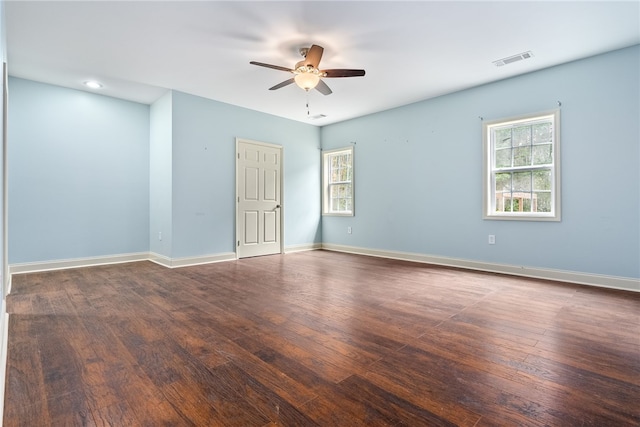 1806 Bluestone Ct, Auburn, AL 36830 - unfurnished room featuring a ceiling fan, healthy amount of natural light, dark wood-type flooring, and baseboards