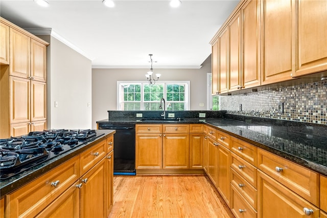 1806 Bluestone Ct, Auburn, AL 36830 - kitchen with a sink, black appliances, light wood-style flooring, a peninsula, and dark stone counters