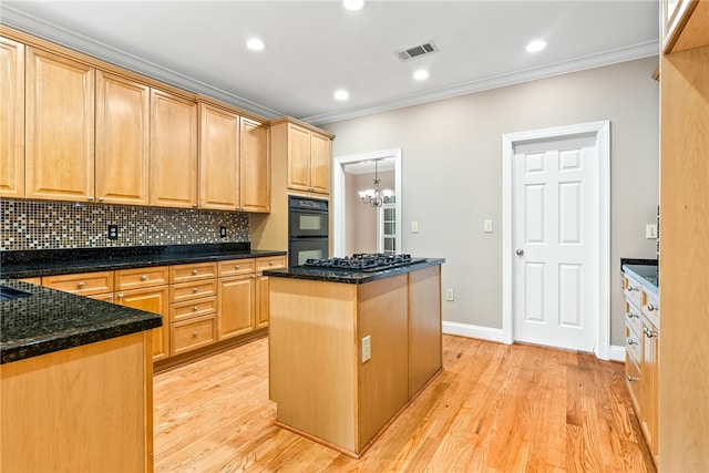 1806 Bluestone Ct, Auburn, AL 36830 - kitchen featuring black appliances, crown molding, tasteful backsplash, a chandelier, and a center island