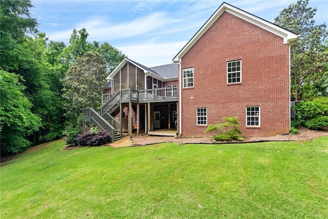 1806 Bluestone Ct, Auburn, AL 36830 - back of property featuring a sunroom, brick siding, stairway, and a yard