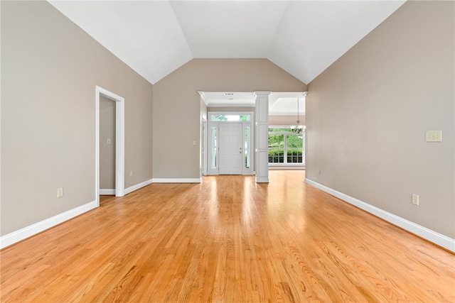 1806 Bluestone Ct, Auburn, AL 36830 - unfurnished room with light wood finished floors, a chandelier, baseboards, vaulted ceiling, and ornate columns