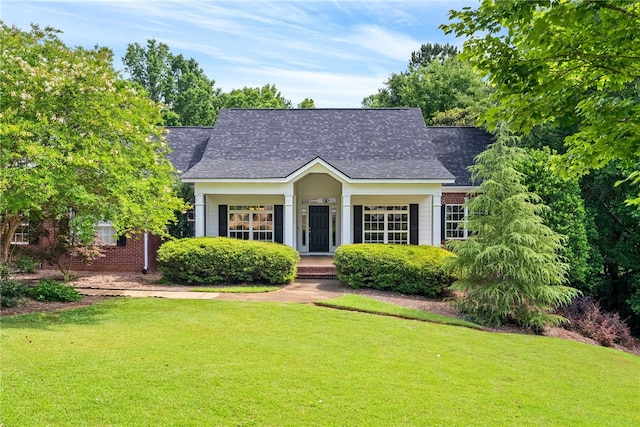 1806 Bluestone Ct, Auburn, AL 36830 - view of front of property with a front yard, a shingled roof, brick siding, and a porch