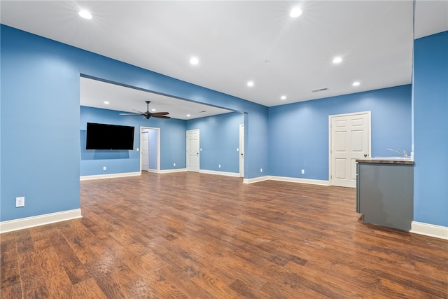 1806 Bluestone Ct, Auburn, AL 36830 - unfurnished living room with a ceiling fan, recessed lighting, dark wood-style floors, baseboards, and a sink
