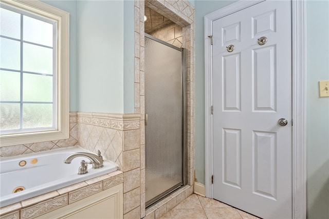 1806 Bluestone Ct, Auburn, AL 36830 - bathroom featuring a stall shower, a jetted tub, and tile patterned flooring