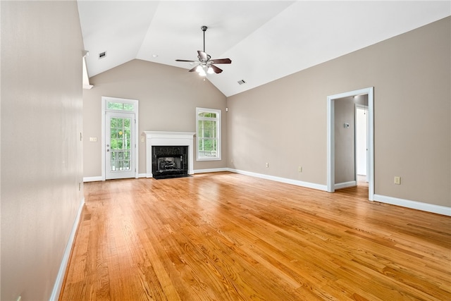 1806 Bluestone Ct, Auburn, AL 36830 - unfurnished living room with ceiling fan, a high end fireplace, light wood-style floors, baseboards, and high vaulted ceiling
