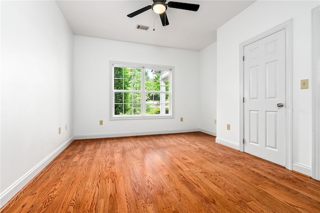 1806 Bluestone Ct, Auburn, AL 36830 - unfurnished room featuring light wood-type flooring, ceiling fan, and baseboards