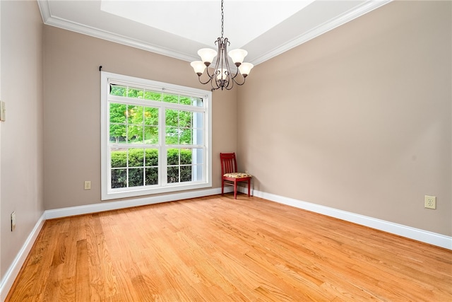 1806 Bluestone Ct, Auburn, AL 36830 - unfurnished room featuring crown molding, a chandelier, light wood-style floors, and baseboards