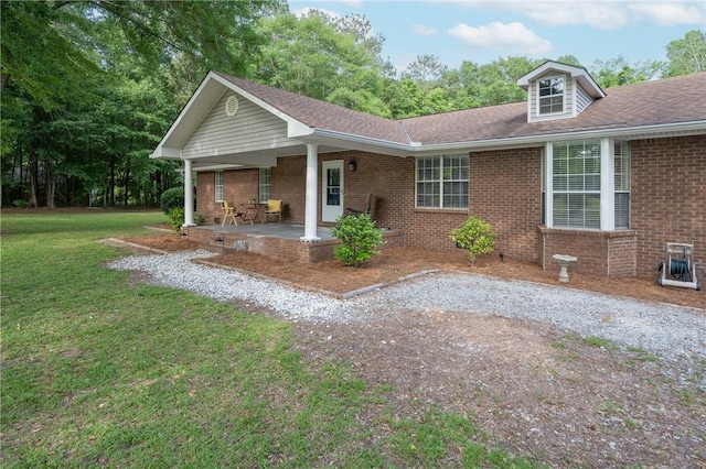 158 Lee Road 242, Phenix City, AL 36870 - view of front of house with a front lawn and brick siding