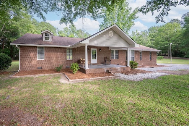 158 Lee Road 242, Phenix City, AL 36870 - view of front of home with crawl space, brick siding, and a front lawn