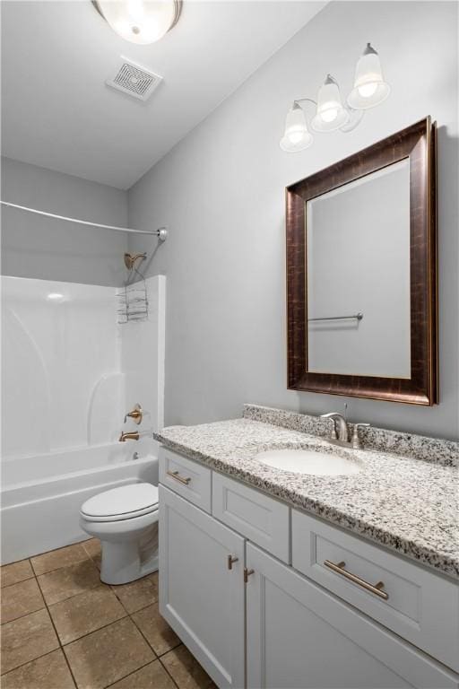 full bathroom with tile patterned floors, vanity,  shower combination, and toilet