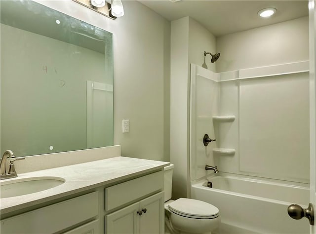 2248 Red Tail Ln, Auburn, AL 36879 - full bathroom with vanity, washtub / shower combination, toilet, and recessed lighting