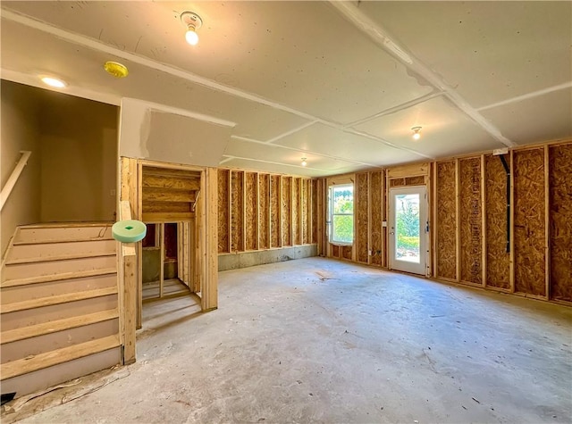 2248 Red Tail Ln, Auburn, AL 36879 - unfurnished living room with concrete flooring