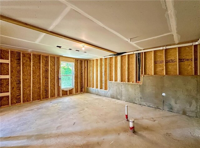 2248 Red Tail Ln, Auburn, AL 36879 - miscellaneous room with unfinished concrete floors