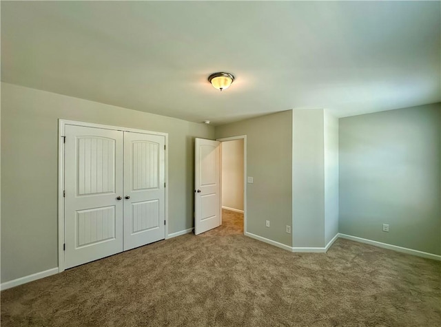 2248 Red Tail Ln, Auburn, AL 36879 - unfurnished bedroom with carpet floors, baseboards, and a closet