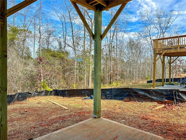 view of yard featuring a wooden deck