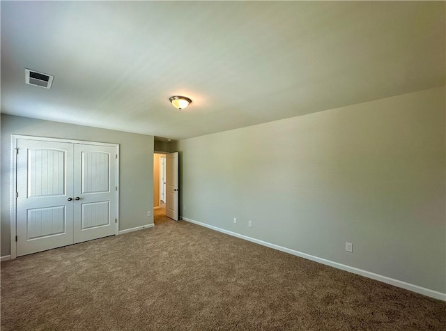 2248 Red Tail Ln, Auburn, AL 36879 - unfurnished bedroom featuring baseboards, carpet flooring, and a closet
