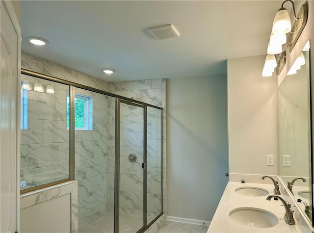 2248 Red Tail Ln, Auburn, AL 36879 - full bathroom with marble look tile flooring, a marble finish shower, baseboards, recessed lighting, and double vanity
