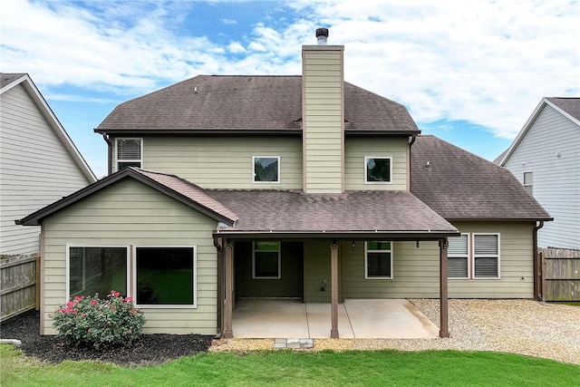 1931 Sequoia Dr, Auburn, AL 36879 - back of property featuring a patio area, a chimney, and a shingled roof