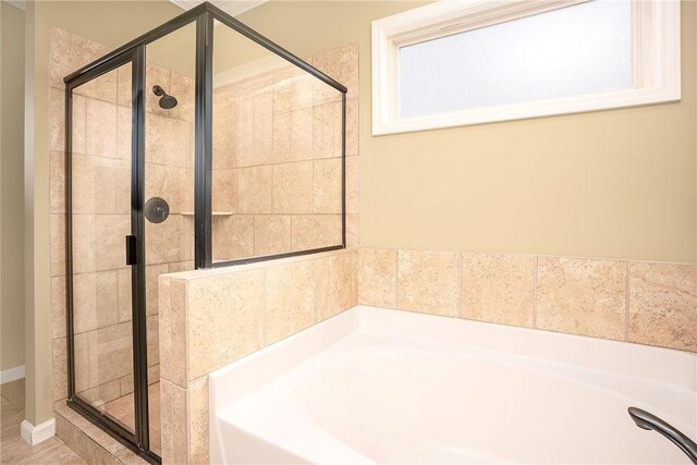 1931 Sequoia Dr, Auburn, AL 36879 - full bathroom with a garden tub and a shower stall