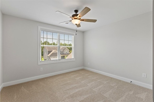 2140 Autumn Ridge Way, Auburn, AL 36879 - unfurnished room with light colored carpet, baseboards, and a ceiling fan