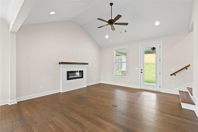 2140 Autumn Ridge Way, Auburn, AL 36879 - unfurnished living room featuring a glass covered fireplace, a ceiling fan, wood finished floors, vaulted ceiling, and stairway