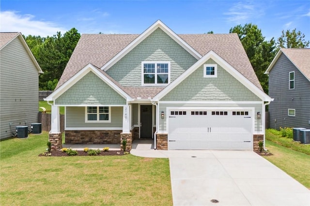 2140 Autumn Ridge Way, Auburn, AL 36879 - craftsman-style house with covered porch, driveway, cooling unit, and a front yard