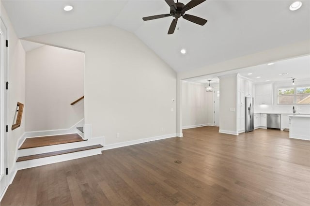 2140 Autumn Ridge Way, Auburn, AL 36879 - unfurnished living room featuring vaulted ceiling, a ceiling fan, recessed lighting, dark wood-style floors, and stairs
