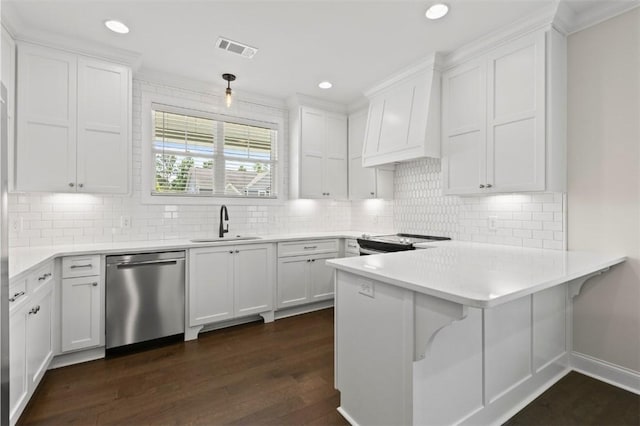 2140 Autumn Ridge Way, Auburn, AL 36879 - kitchen with stainless steel appliances, a sink, dark wood finished floors, white cabinetry, and recessed lighting