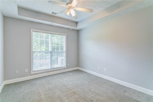 2331 Morgan Dr, Auburn, AL 36830 - empty room with carpet, a raised ceiling, and ceiling fan