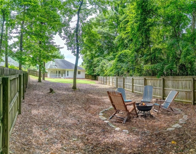 2331 Morgan Dr, Auburn, AL 36830 - fenced backyard with an outdoor fire pit
