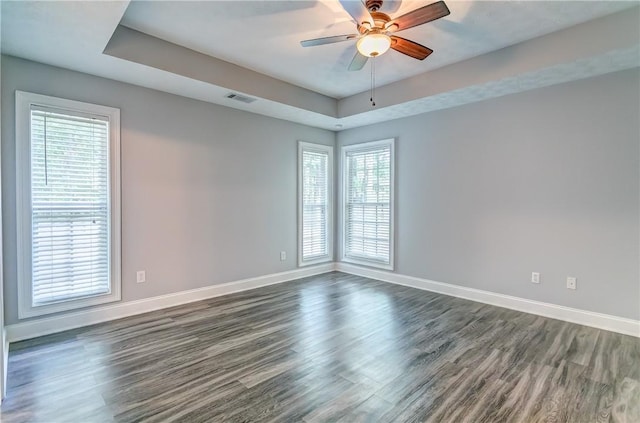 2331 Morgan Dr, Auburn, AL 36830 - spare room with dark wood finished floors, a raised ceiling, healthy amount of natural light, and ceiling fan
