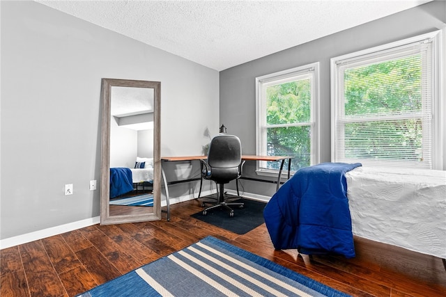 427 Harper Ave Unit 16, Auburn, AL 36830 - office area with wood finished floors, vaulted ceiling, and a textured ceiling