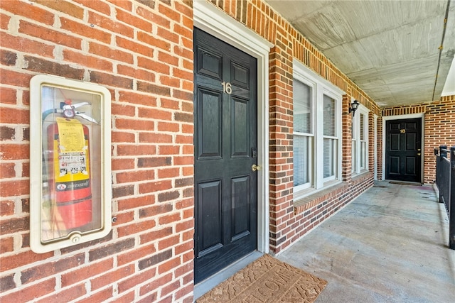 427 Harper Ave Unit 16, Auburn, AL 36830 - property entrance with a porch and brick siding