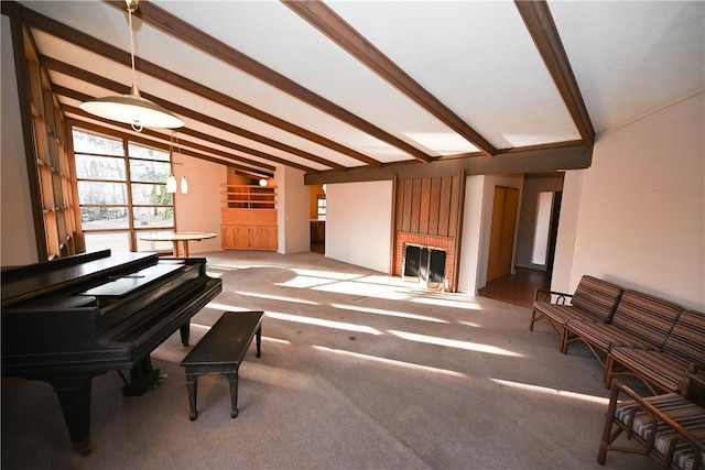 interior space featuring a fireplace, carpet floors, and lofted ceiling with beams