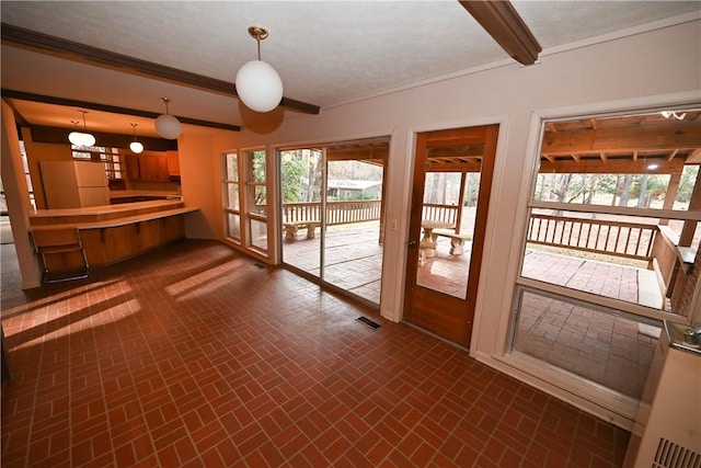 interior space with beamed ceiling