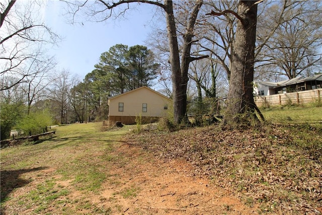 view of yard featuring fence