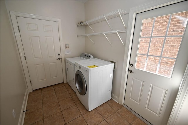 1758 Brookeview Ct, Auburn, AL 36830 - laundry room with washer and dryer, light tile patterned flooring, and baseboards