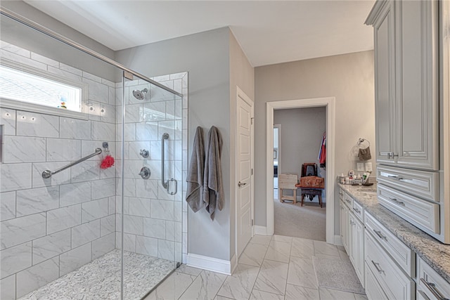 bathroom featuring vanity and walk in shower