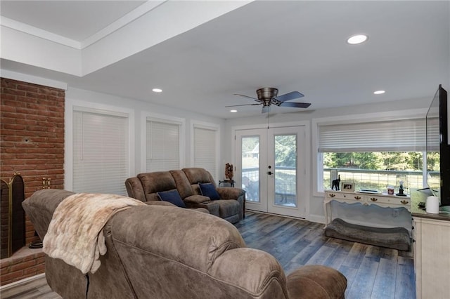 living room with french doors, crown molding, and wood-type flooring